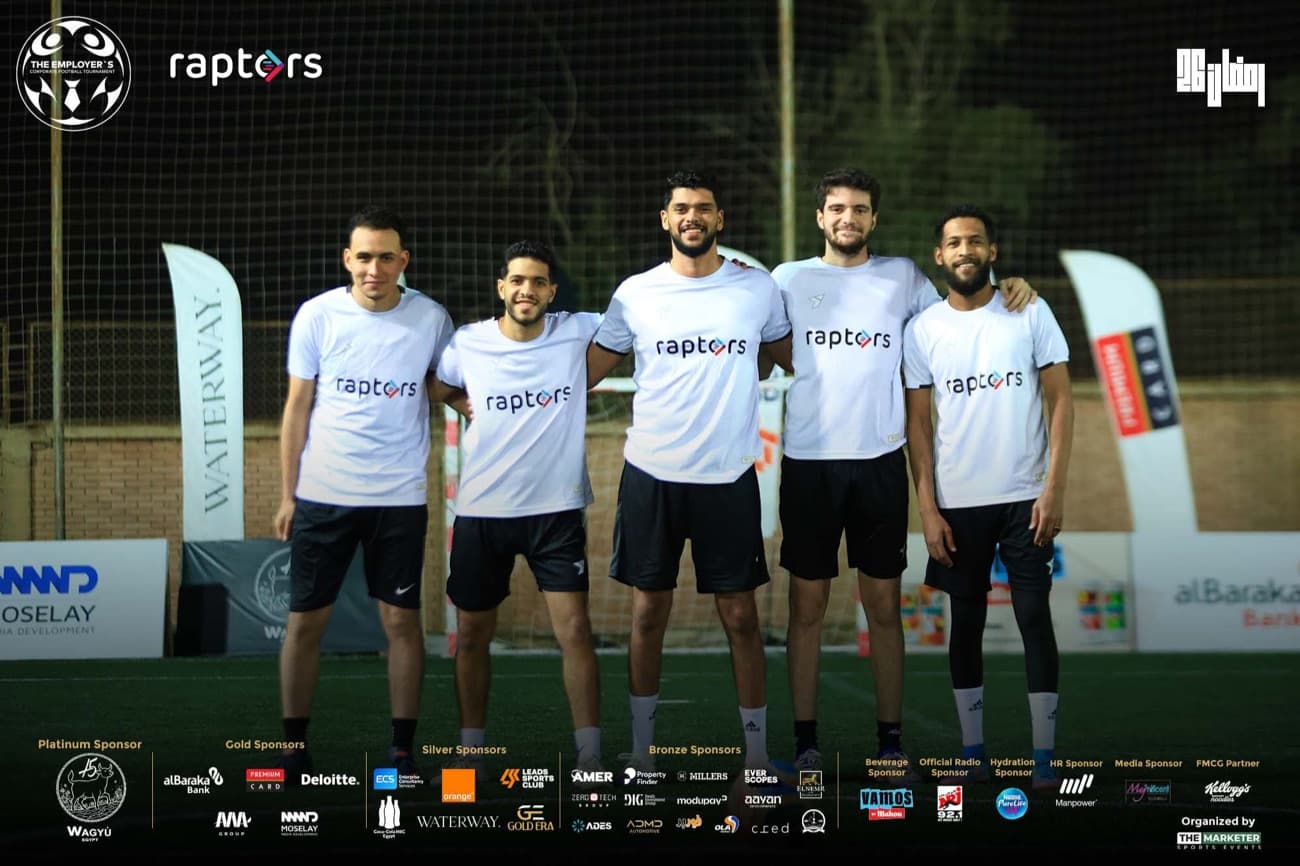 The five-a-side football tournament team in branded shirts