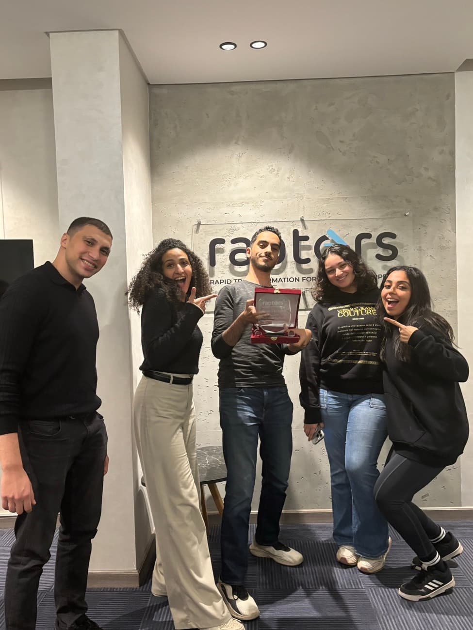 Colleagues celebrating an award win