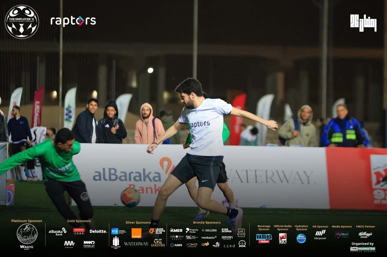 A five-a-side match, with the team watching from the touchline