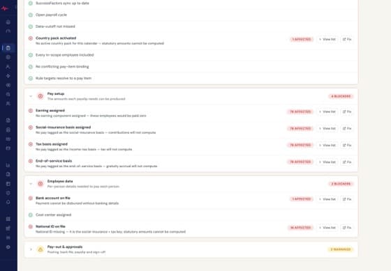 nábd Pay readiness check view listing blocking and warning findings by employee before a payroll run.